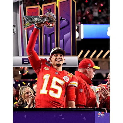 Patrick Mahomes Kansas City Chiefs Unsigned Super Bowl LVIII Vince Lombardi Trophy Photograph