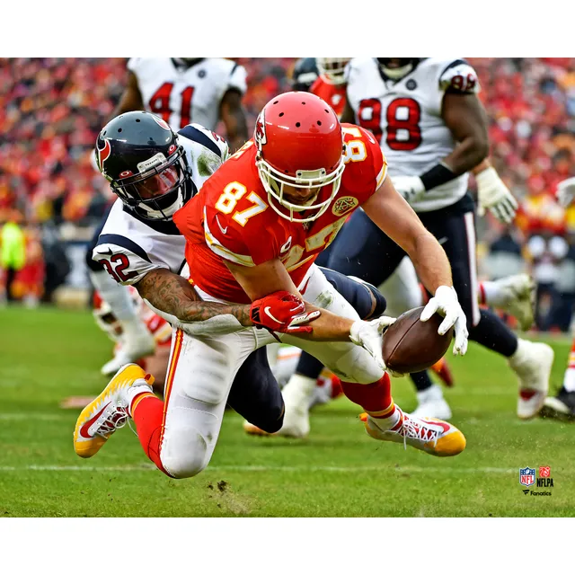 Derwin James Los Angeles Chargers Unsigned Tackles Travis Kelce Photograph