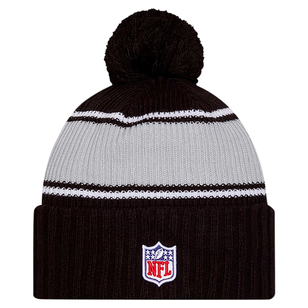 Men's New Era Black Las Vegas Raiders 2024 Sideline Sport Cuffed Knit Hat with Pom