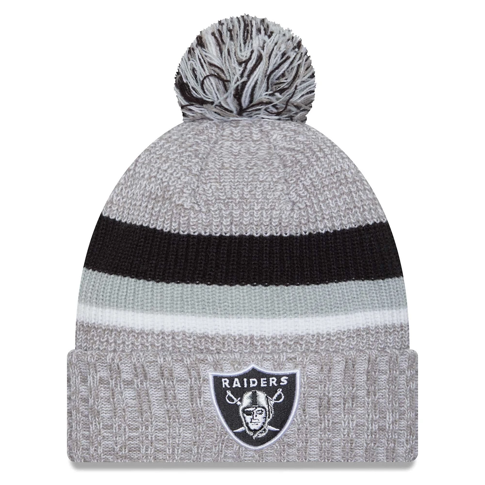 Bonnet en tricot à revers Las Vegas Raiders New Era gris chiné pour hommes avec pompon