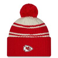 Youth New Era Cream/Black Las Vegas Raiders 2022 Sideline - Sport Cuffed Pom Knit Hat
