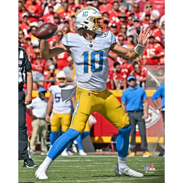 Justin Herbert Los Angeles Chargers Unsigned White Jersey Spotlight Photograph