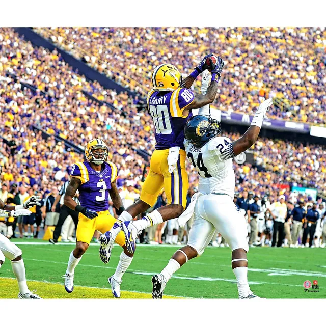 Justin Jefferson LSU Tigers Unsigned Purple Jersey Running Photograph