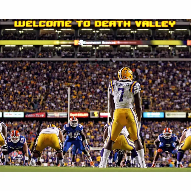 Joe Burrow LSU Tigers Unsigned White Jersey Throwing Photograph