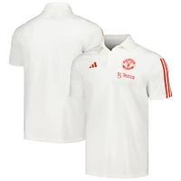 Polo d'entraînement terrain Manchester United 2023/24 adidas blanc pour homme