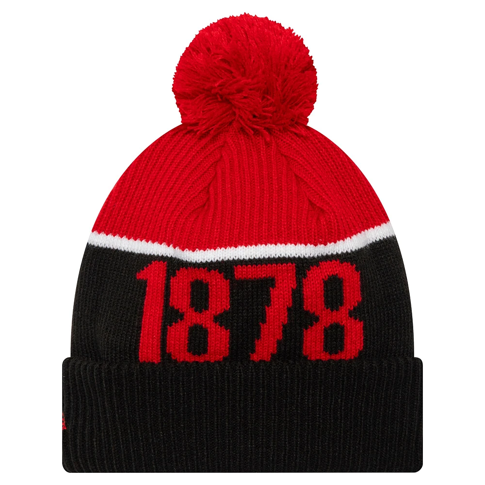 Bonnet en tricot à revers Manchester United Sport New Era noir pour hommes avec pompon