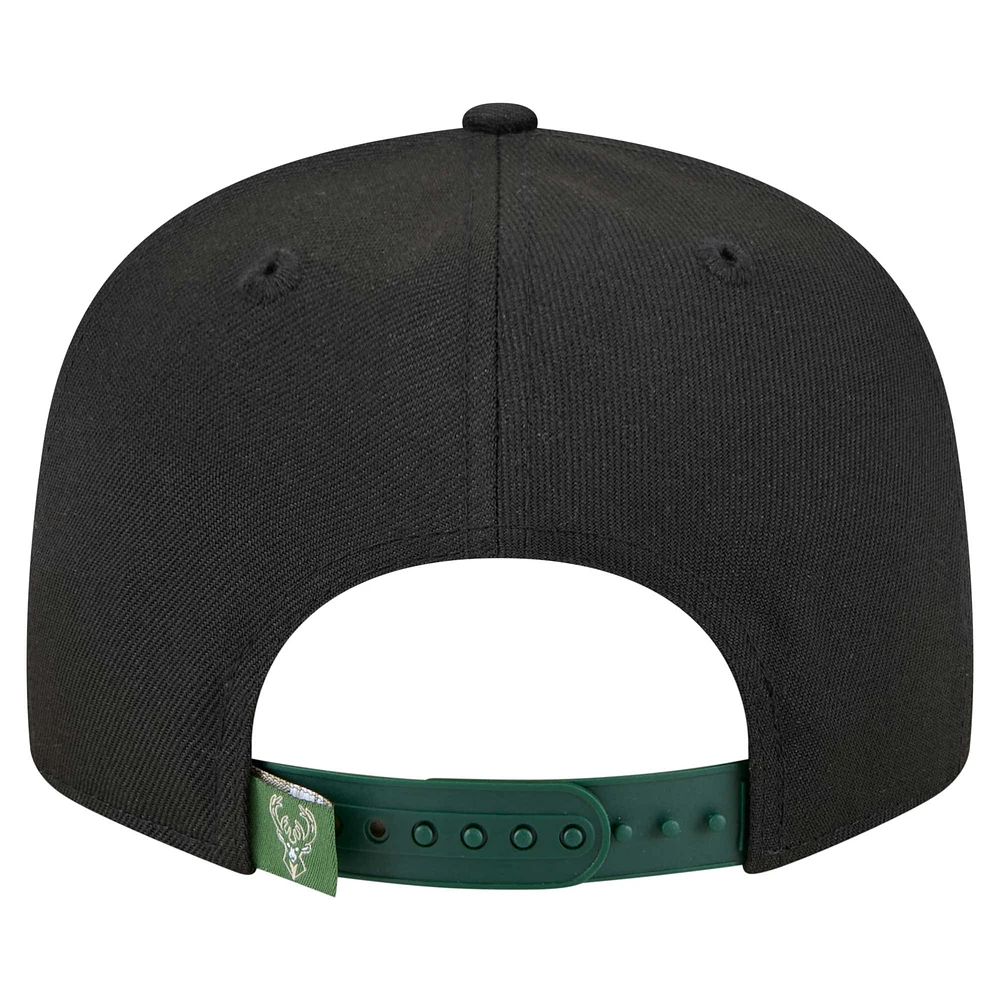 Men's New Era Black/Hunter Green Milwaukee Bucks Sport Night Splatter Two-Tone Snapback 9FIFTY Snapback Hat