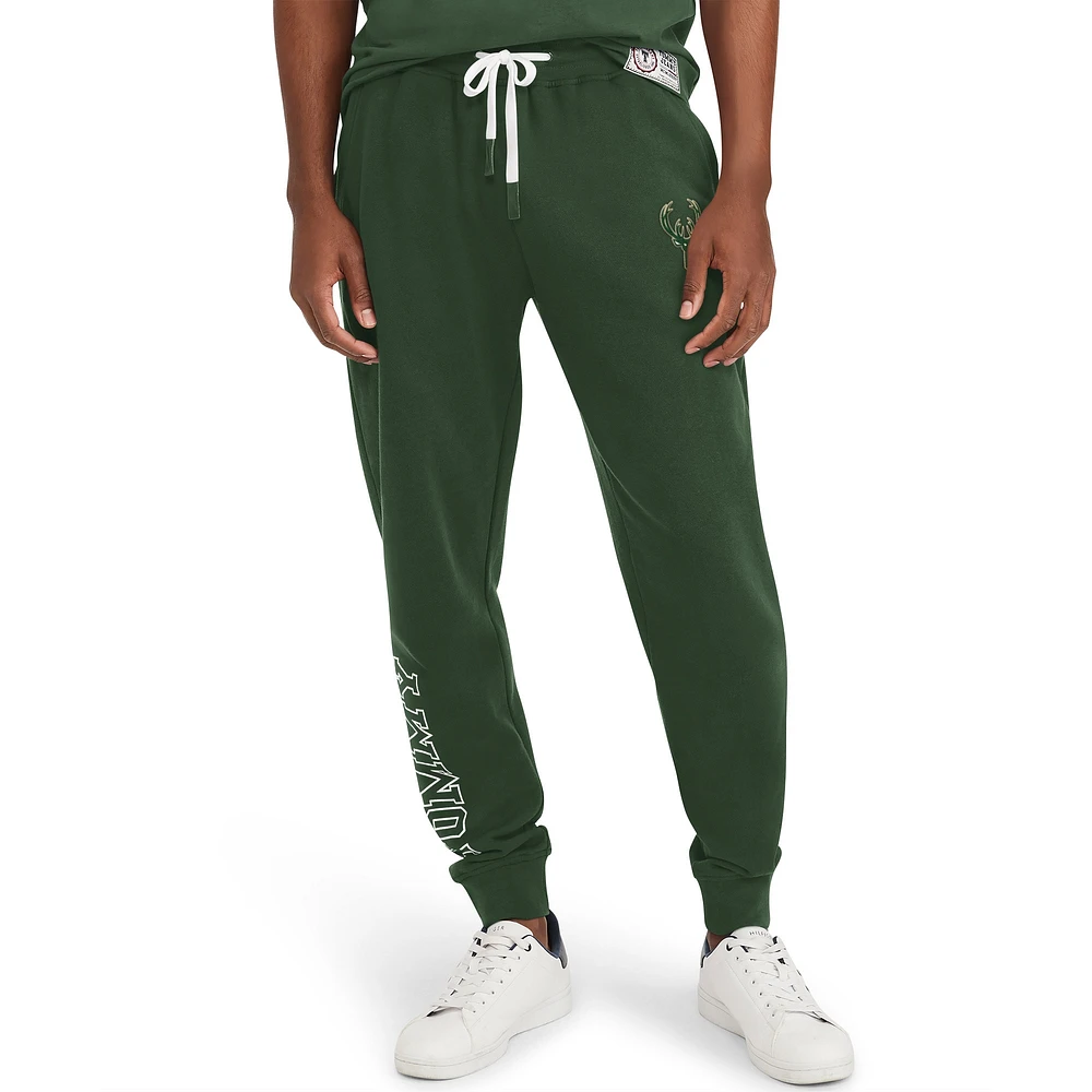 Pantalon de jogging en molleton bi-mélange Carl Milwaukee Bucks Tommy Jeans pour homme vert