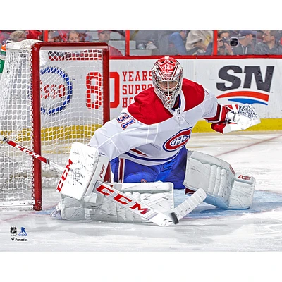 Carey Price Montreal Canadiens Unsigned White Jersey Stick Save Photograph