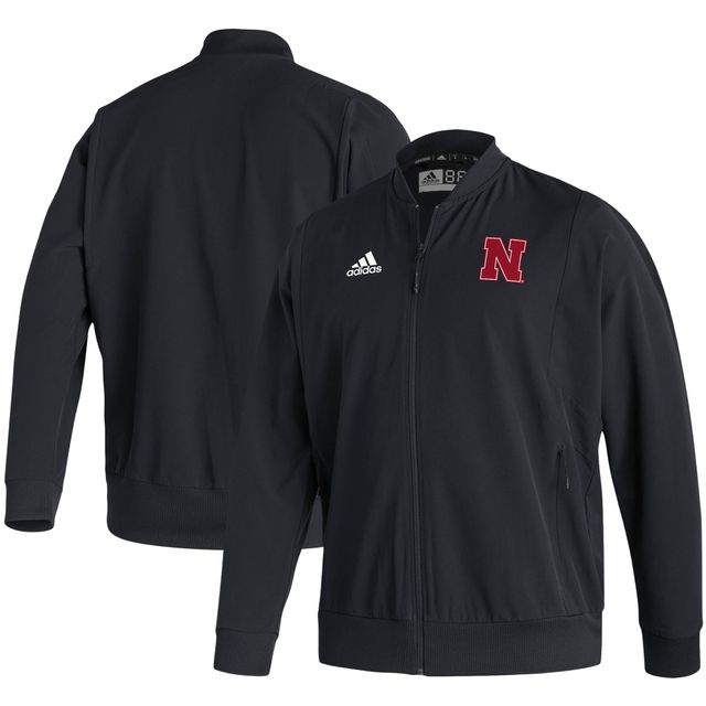 Blouson aviateur adidas noir Nebraska Huskers 2021 Sideline tissé Primeblue entièrement zippé pour homme