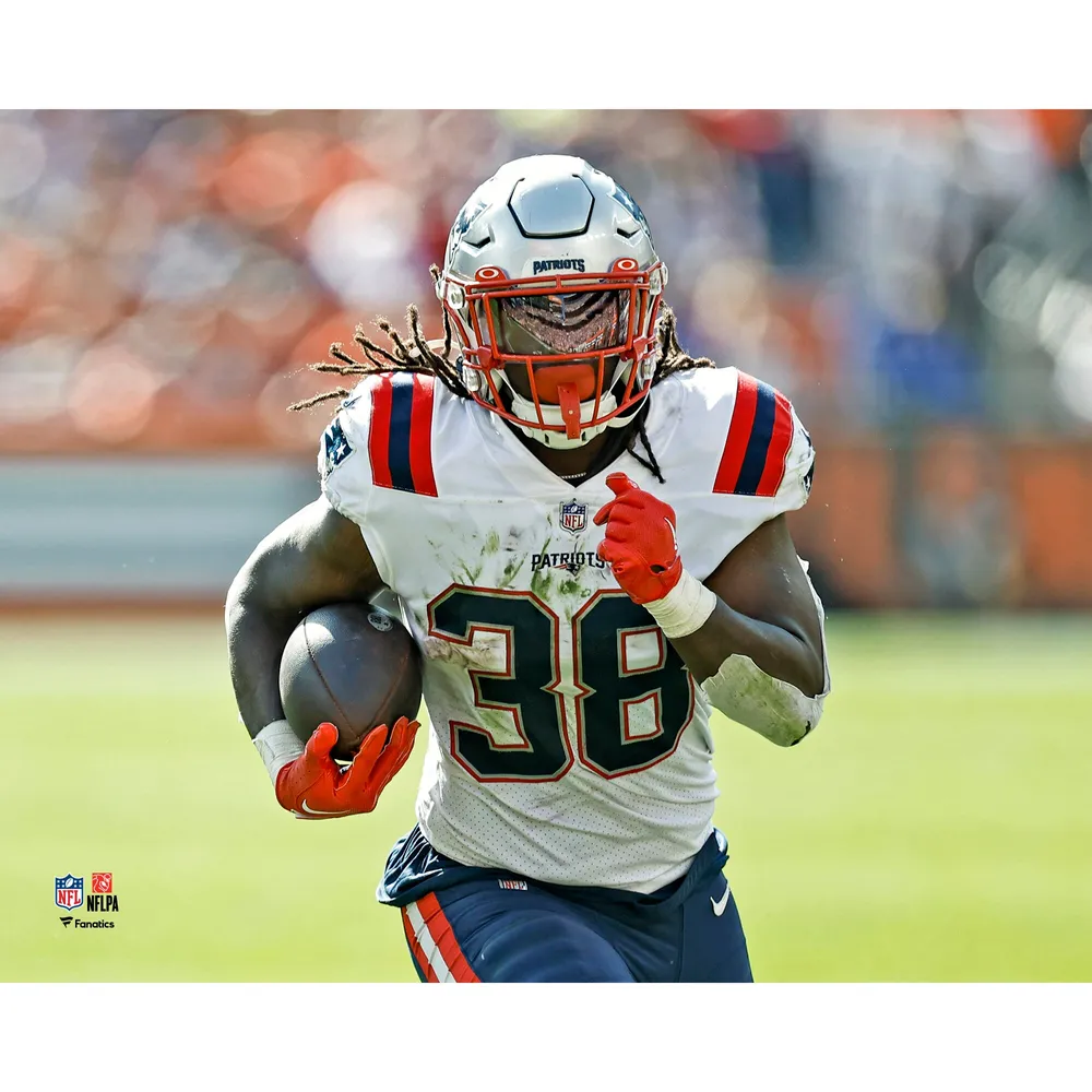 New England Patriots' Rhamondre Stevenson runs against the Detroit