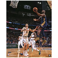 Zion Williamson New Orleans Pelicans Autographed 16" x 20" Navy Jersey Layup Vertical Photograph