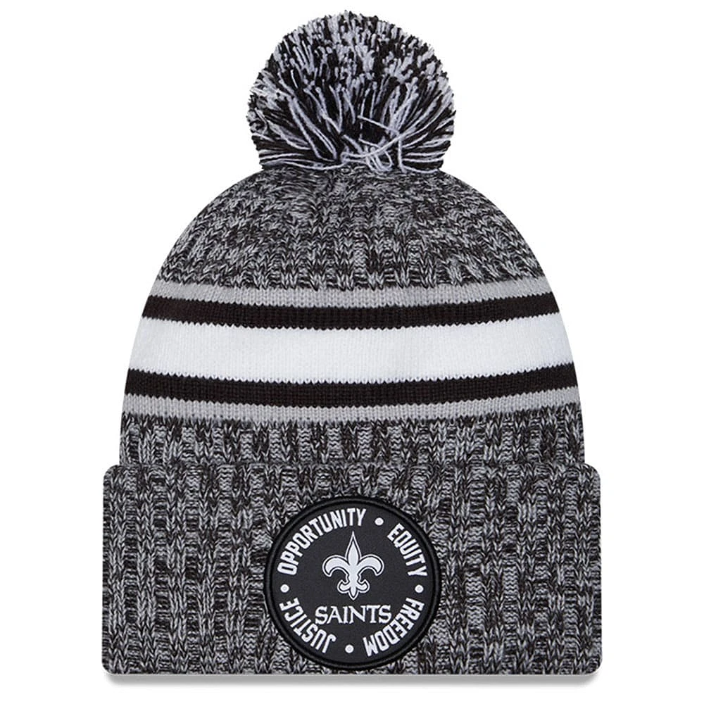 Bonnet en tricot à revers New Era Heather Black New Orleans Saints 2023 Inspire Change pour hommes avec pompon