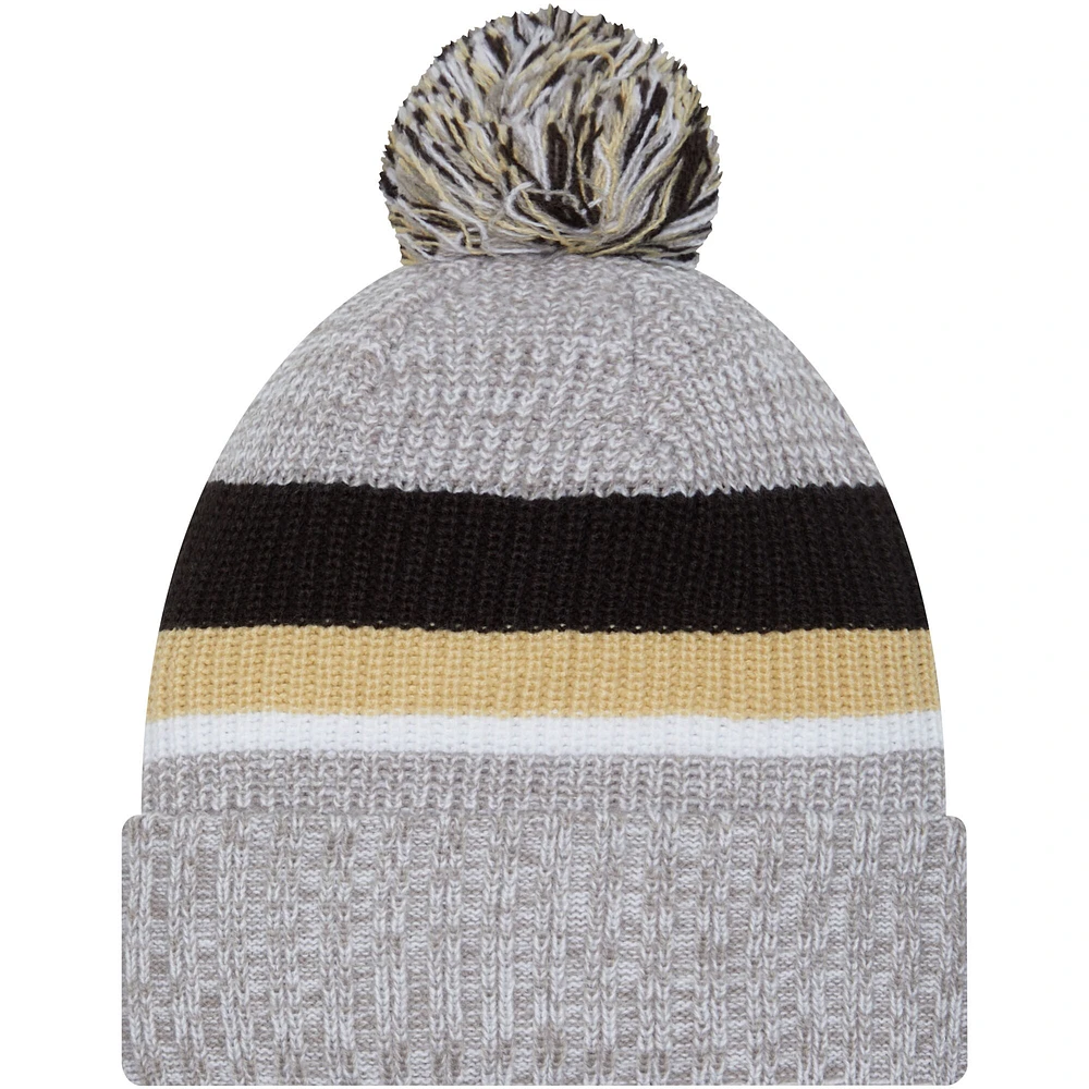 Bonnet en tricot à revers New Orleans Saints New Era gris chiné pour hommes avec pompon