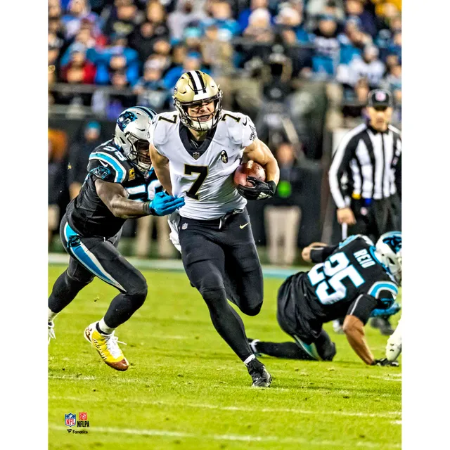 Taysom Hill New Orleans Saints Fanatics Authentic Unsigned Carries the Ball  in Black Jersey Photograph