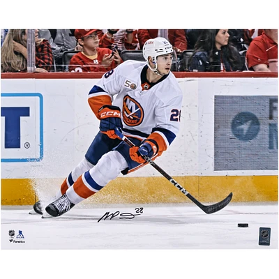 New York Islanders Alexander Romanov Autographed 16" x 20" White Jersey with Puck Photograph