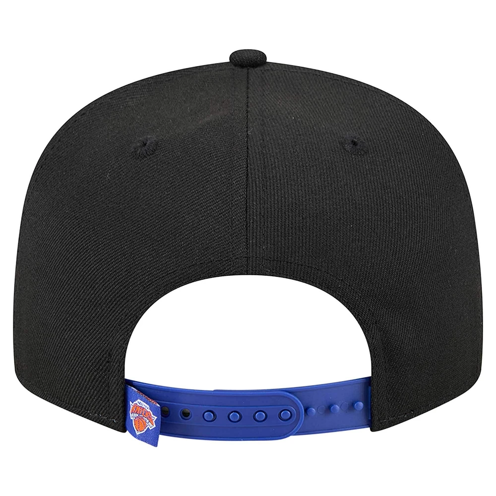 Men's New Era Black/Blue New York Knicks Sport Night Splatter Two-Tone Snapback 9FIFTY Snapback Hat