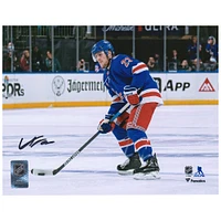 Adam Fox New York Rangers Autographed 8'' x 10'' Blue Jersey with Puck Photograph