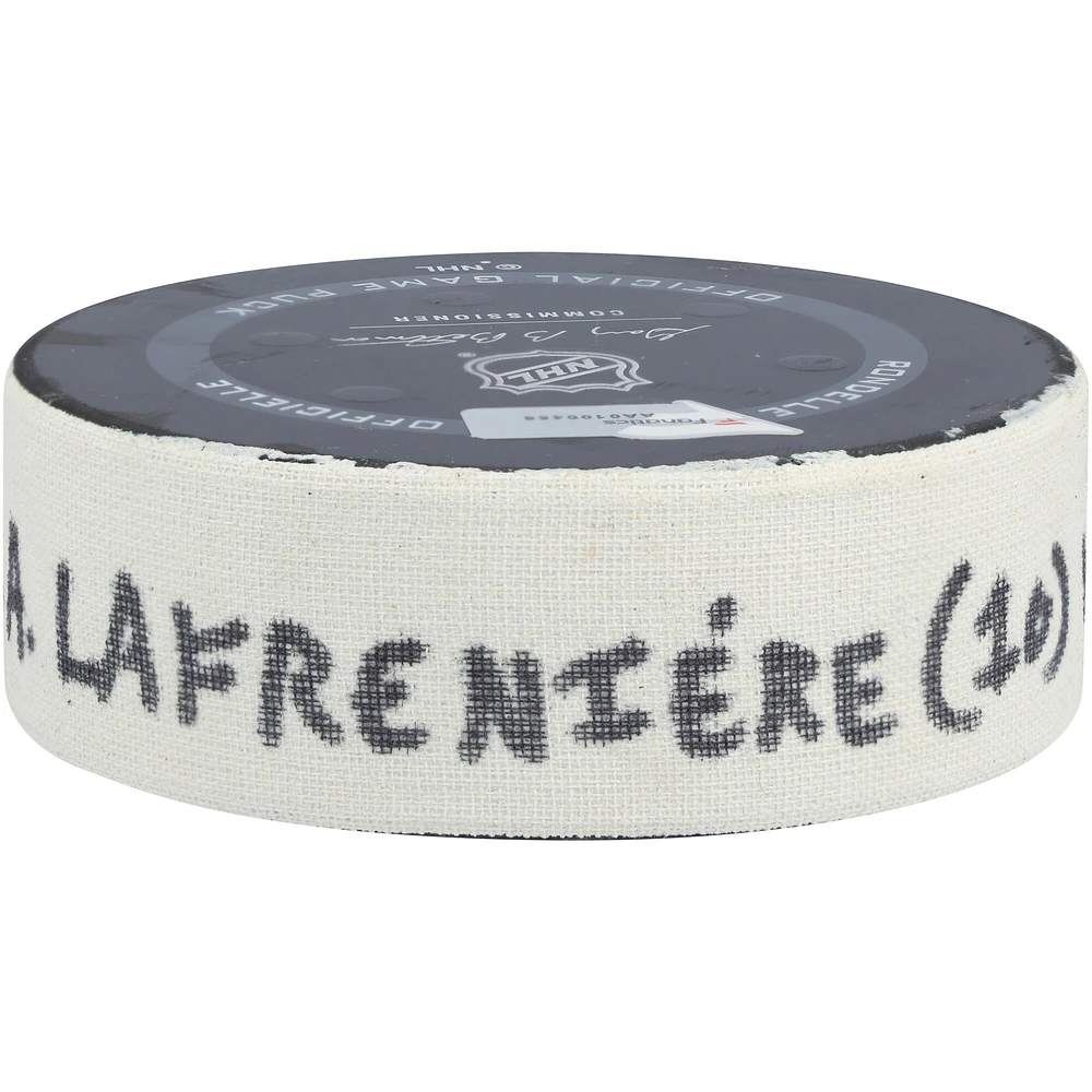 Rondelle de but autographiée par Alexis Lafreniere des Rangers de New York lors du match du 1er février 2022 contre les Panthers de la Floride