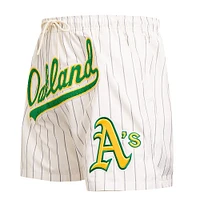 Short tissé classique rétro à rayures Oakland Athletics Pro Standard pour homme, couleur crème