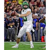 Justin Herbert Oregon Ducks Unsigned All White Throwing Photograph