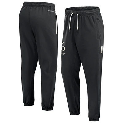 Men's Nike  Black Oregon Ducks Basketball Travel Fleece Performance Pants