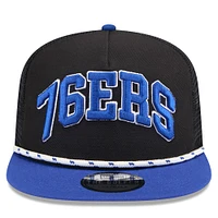 Men's New Era Black/Royal Philadelphia 76ers Throwback Team Arch Golfer Snapback Hat