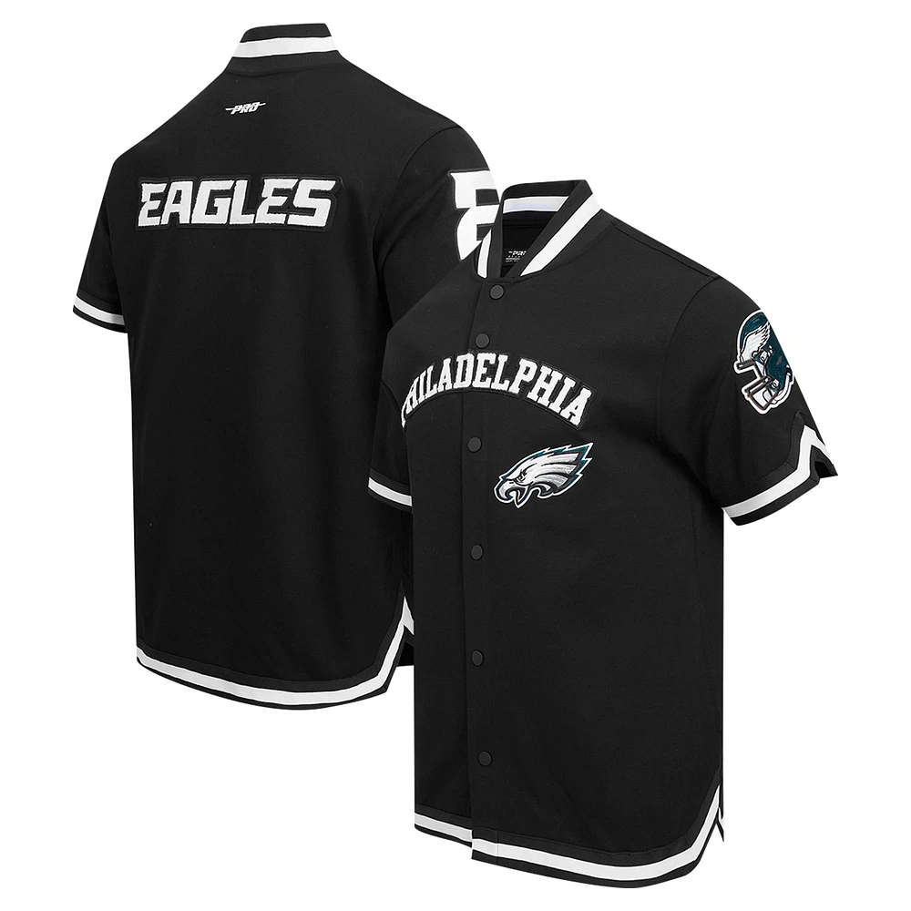 Veste d'échauffement classique à manches courtes et bouton-pression Pro Standard pour hommes, noire, des Eagles de Philadelphie