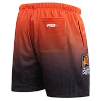 Men's Post Devin Booker Black/Orange Phoenix Suns Ombre Name & Number Shorts