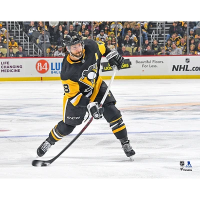 Kris Letang Pittsburgh Penguins Unsigned Black Jersey Shooting Photograph
