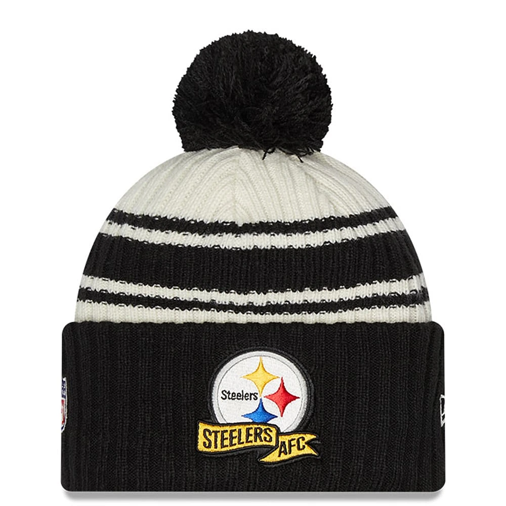 Youth New Era Cream/Black Pittsburgh Steelers 2022 Sideline - Sport Cuffed Pom Knit Hat