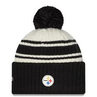 Youth New Era Cream/Black Pittsburgh Steelers 2022 Sideline - Sport Cuffed Pom Knit Hat