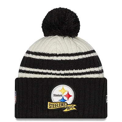 Youth New Era Cream/Black Pittsburgh Steelers 2022 Sideline - Sport Cuffed Pom Knit Hat