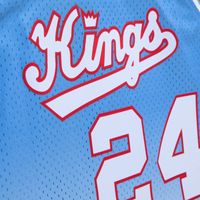 Men's Mitchell & Ness Reggie Theus White/Light Blue Sacramento Kings 1985/86 Hardwood Classics Fadeaway Swingman Player Jersey