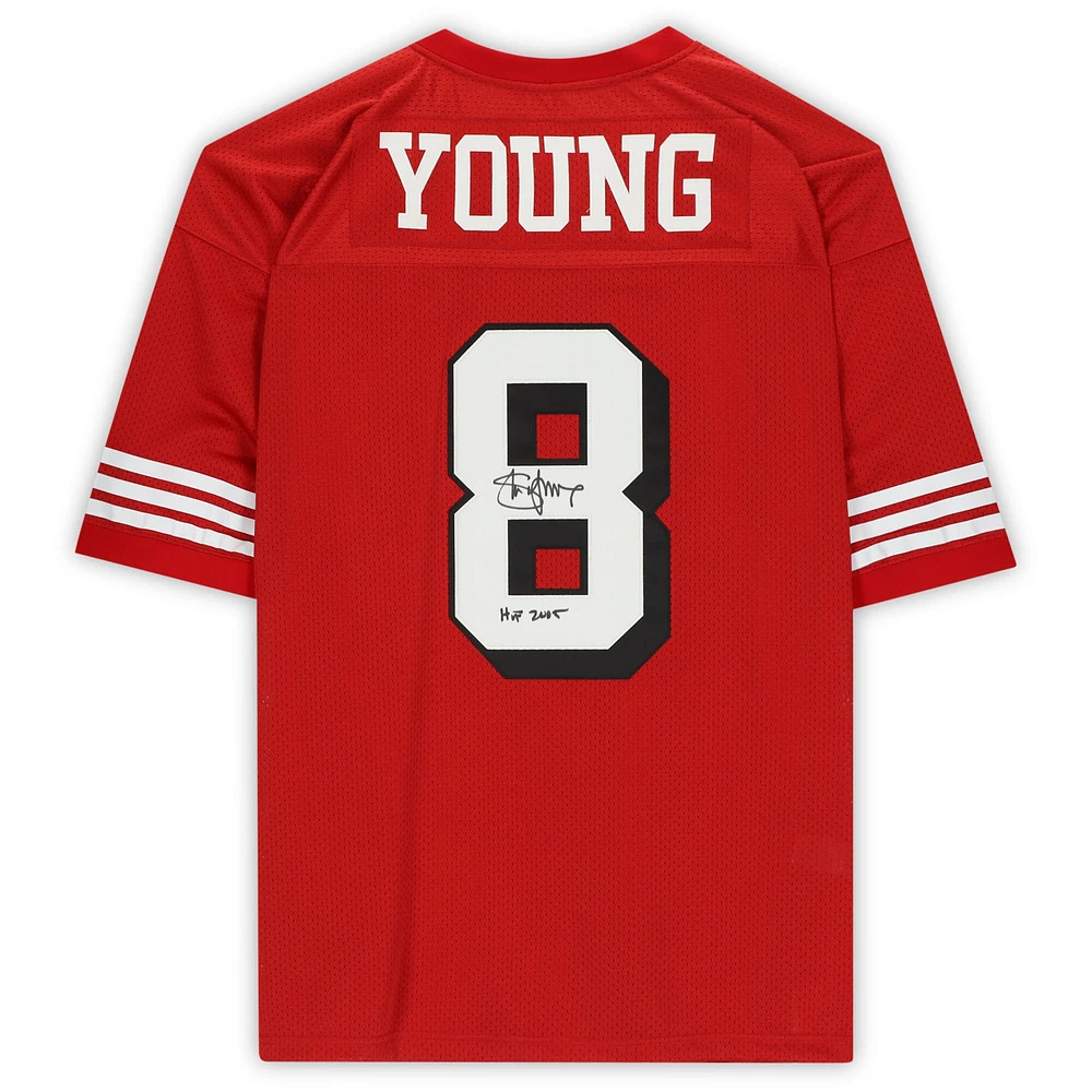 Maillot réplique rouge autographié par Steve Young des San Francisco 49ers avec l'inscription "HOF 2005"