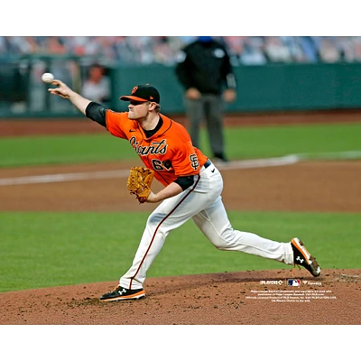 Photographie de Logan Webb, lanceur non signé des Giants San Francisco, portant un maillot orange