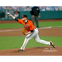 Logan Webb San Francisco Giants Unsigned Pitching in Orange Jersey Photograph