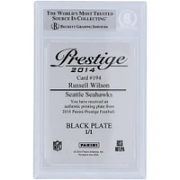 Russell Wilson Seattle Seahawks Plaque d'impression Panini Prestige noire autographiée 2014 #194 #1/1 Beckett Fanatics Carte authentifiée avec témoin