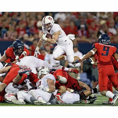 Christian McCaffrey Stanford Cardinal Unsigned Black Jersey Diving for  Catch vs. Washington State Photograph