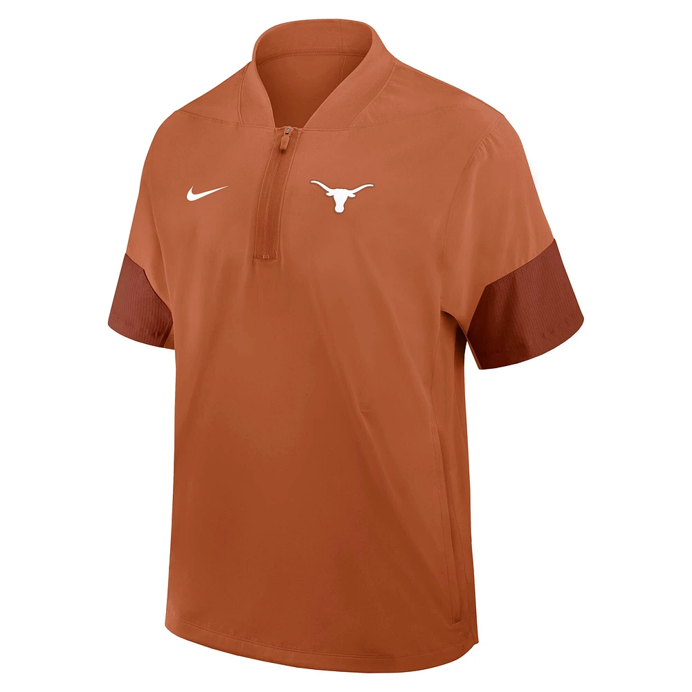Veste d'entraîneur Nike orange brûlé Texas Longhorns 2025 Sideline à manches courtes et quart de zip pour homme