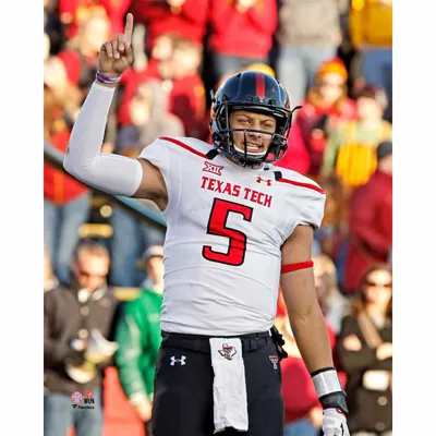 Patrick Mahomes Texas Tech Red Raiders Unsigned White Jersey Scrambling Throwing Down Field Photograph