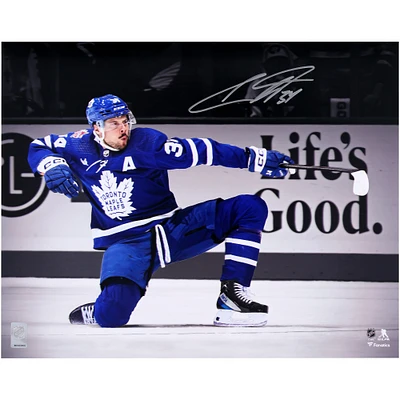 Auston Matthews Toronto Maple Leafs Autographed 16" x 20" One Knee Celebrating Spotlight Photograph