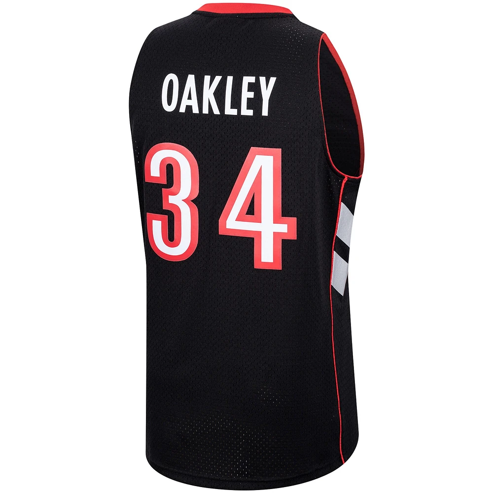 Hommes Mitchell & Ness Charles Oakley Violet Toronto Raptors Hardwood Classics 1999 Swingman - Maillot