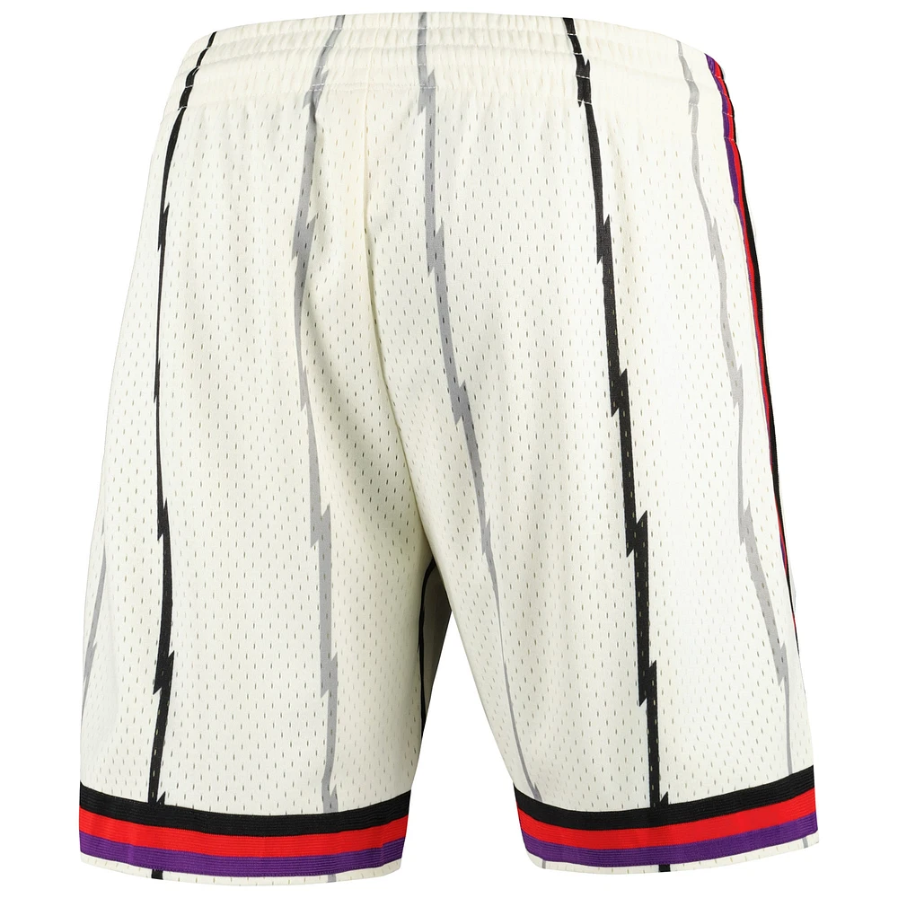 Men's Mitchell & Ness Cream Toronto Raptors Chainstitched Swingman Shorts