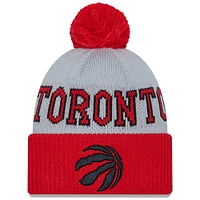 Bonnet en tricot à revers Tip-Off des Raptors de Toronto New Era gris/rouge pour hommes avec pompon