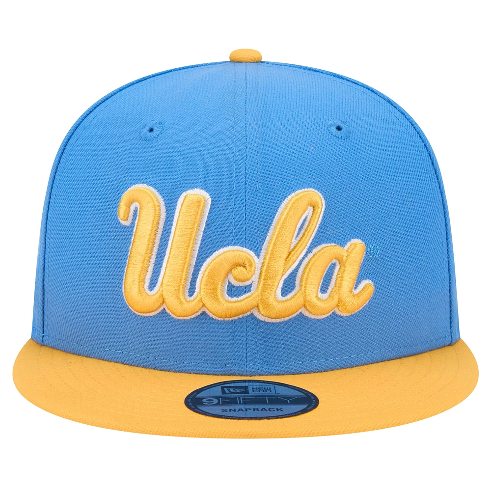 Casquette Snapback bicolore 9FIFTY bleue New Era pour homme des Bruins de l'UCLA