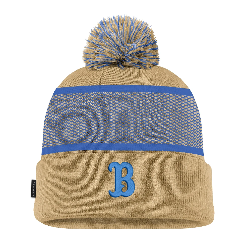 Bonnet en tricot à revers Nike Gold UCLA Bruins 2024 Sideline Peak avec pompon pour jeune