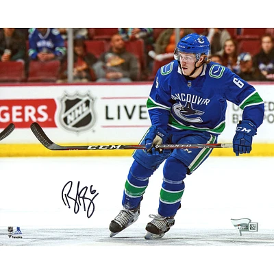Brock Boeser Vancouver Canucks Autographed 8" x 10" Blue Jersey Horizontal Skating Photograph