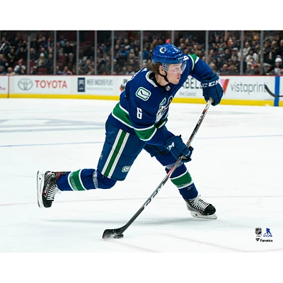 Brock Boeser Vancouver Canucks Unsigned Blue Jersey Shooting Photograph
