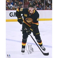 Elias Pettersson Vancouver Canucks Autographed 16" x 20" Black Alternate Jersey Skating Photograph